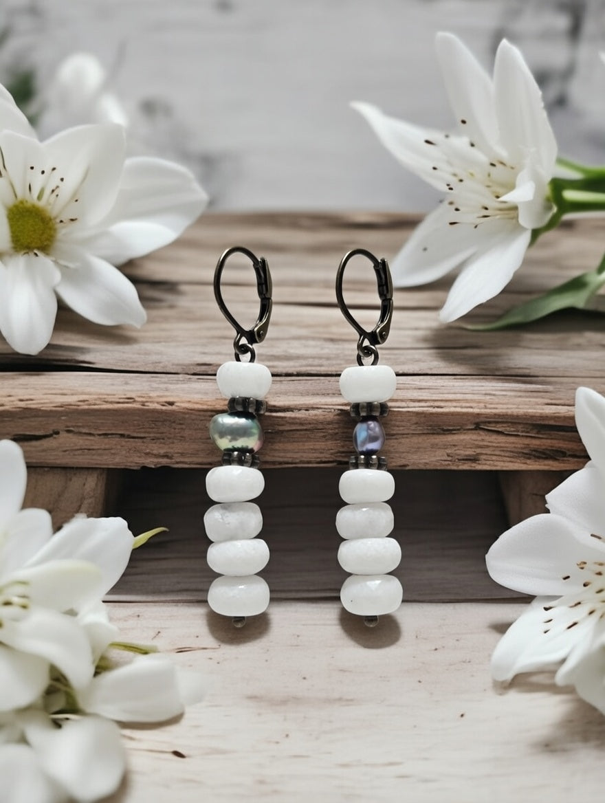 Earrings with cacholong and black pearls